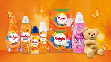 Op de banner is het robijn beertje te zien met verschillende producten van Robijn in oranje.
